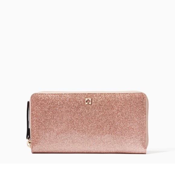 kate spade Handbags - NWT Kate Spade Rose Gold Mavis St Neda Wallet